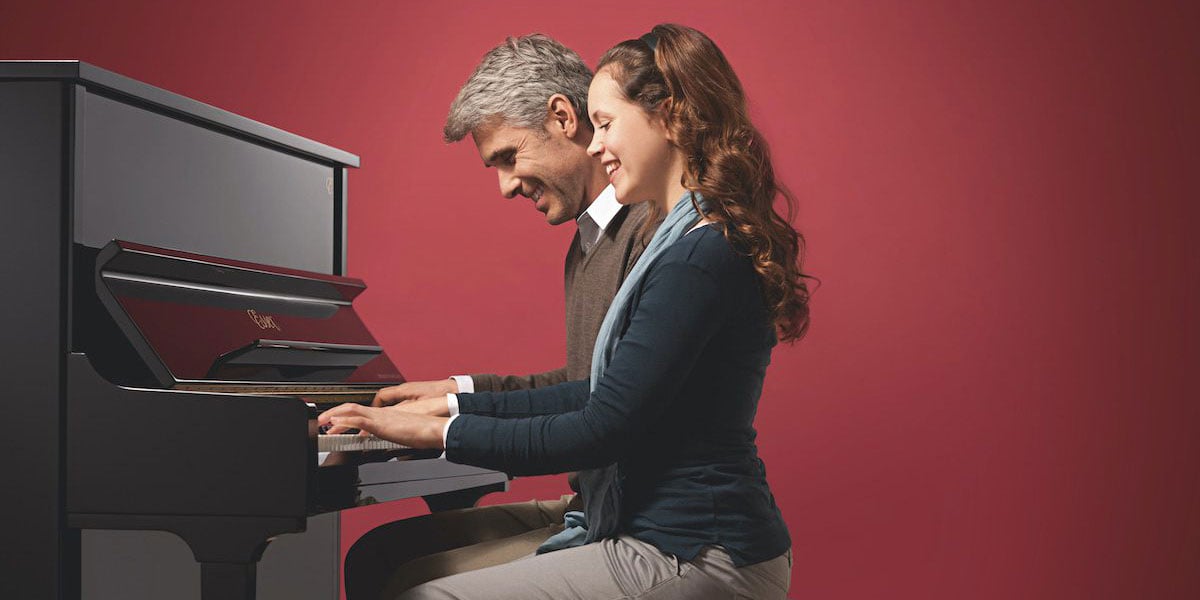 Instructor & Student At Piano