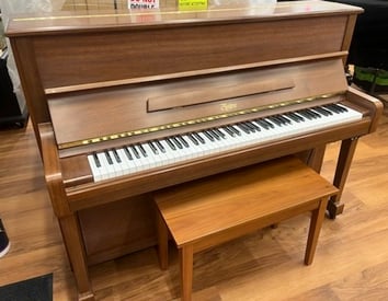 gallery image of piano