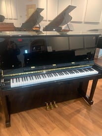 gallery image of piano